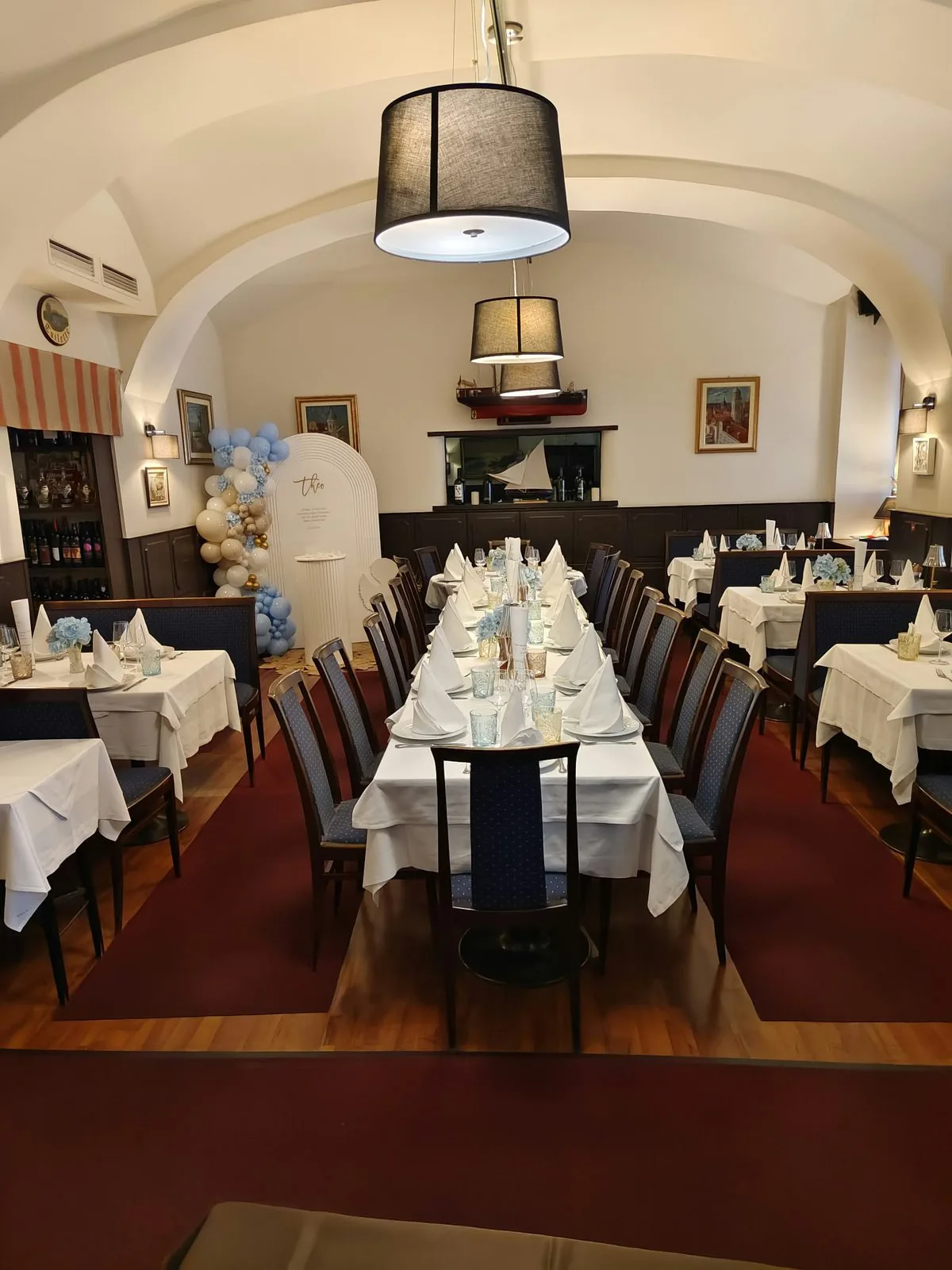 The Ragusa dining room with laid tables